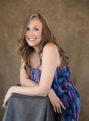 Suzanna Matthews smiling at camera