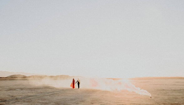 man and woman beneath horizon