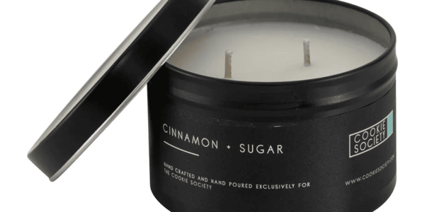 Cookie Society candle in a black metal tin