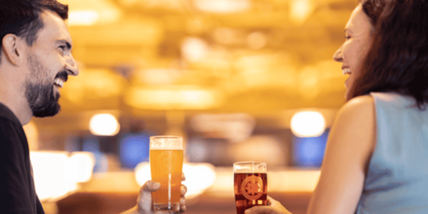Couple drinking beer at Highland Brewing