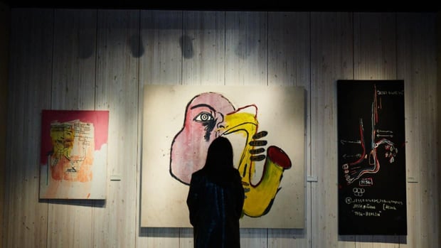 king pleasure exhibit woman looking at painting