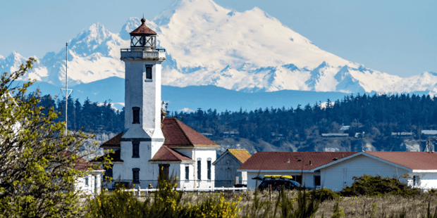 Port Townsend lighthouse in front of Mount Baker