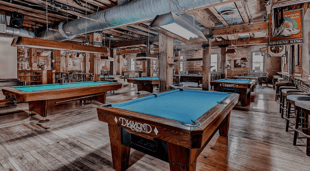 A photo of Wynkoop's second floor, complete with billiards and arcade games.