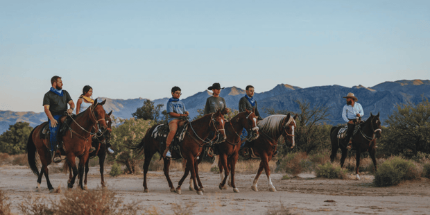 People at Sandy Valley Ranch riding horses
