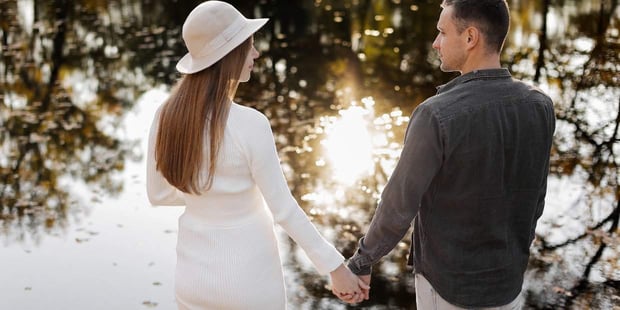 international couple holding hands