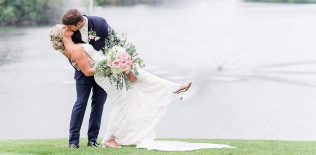 couple kissing on grand geneva grounds