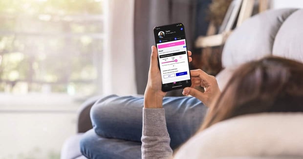 Photo of woman using OkCupid app