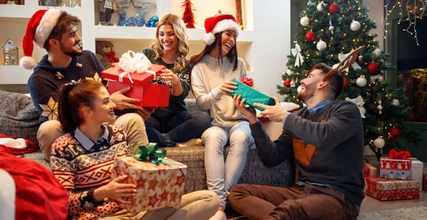 Photo of a family exchanging gifts