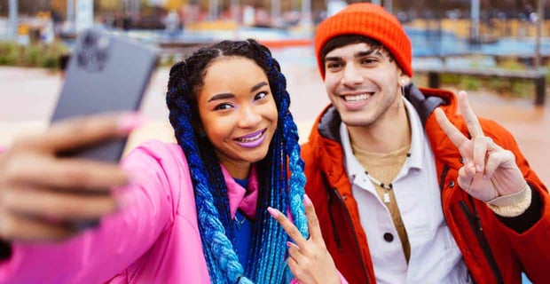 Photo of young people taking a selfie