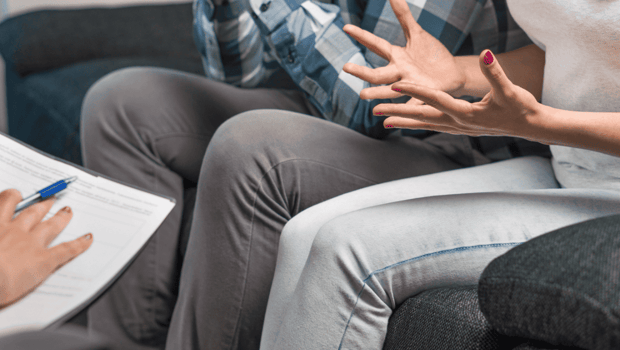 Stock photo of a couple fighting at couples therapy Stock photo of a couple fighting at couples therapy