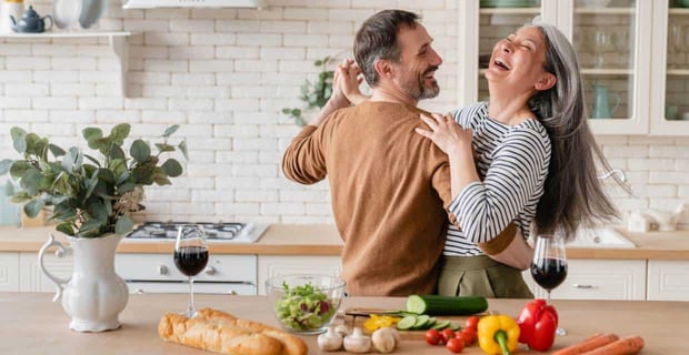 Photo of couple cooking
