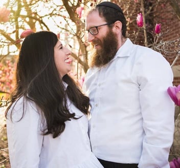 Chabad couple looking at each other
