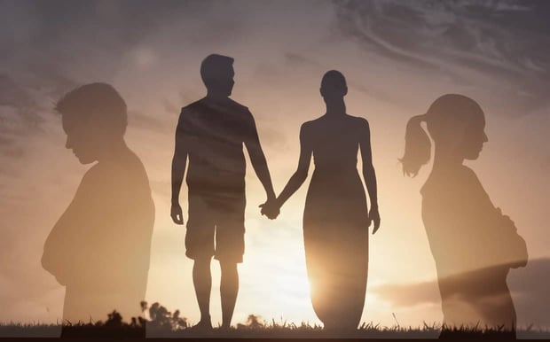 Photo of Couple Silhouettes Walking And Holding Hands. The couple stands back to back with their arms crossed on either side of the walking couple. Photo of Couple Silhouettes Walking And Holding Hands. The couple stands back to back with their arms crossed on either side of the walking couple.