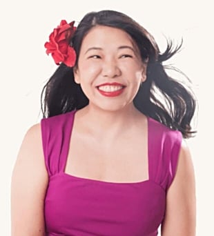 Dr. Martha Tara Lee headshot flower in hair