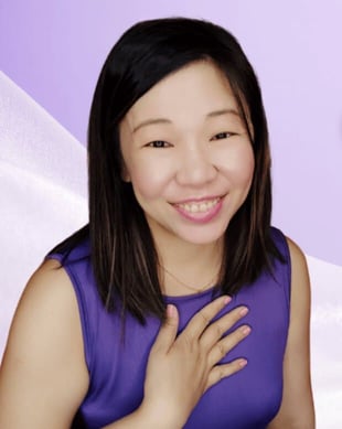 Dr. Martha Tara Lee headshot purple shirt 