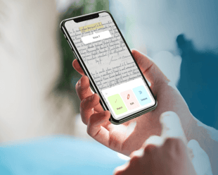 FamilySearch holding phone with ancestry info 