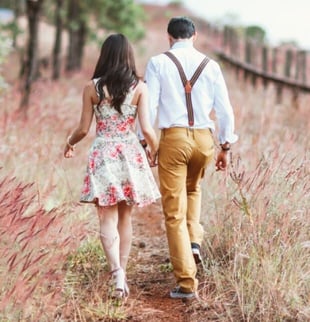 Match by Julia screenshot of young couple walking through pink field