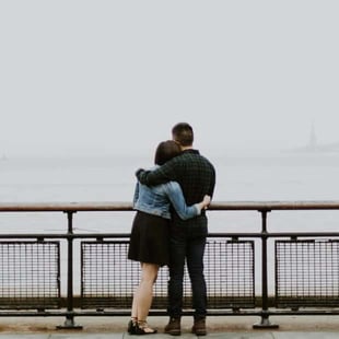 Insight Counseling Center couple from behind hugging looking out at fog Insight Counseling Center couple from behind hugging looking out at fog