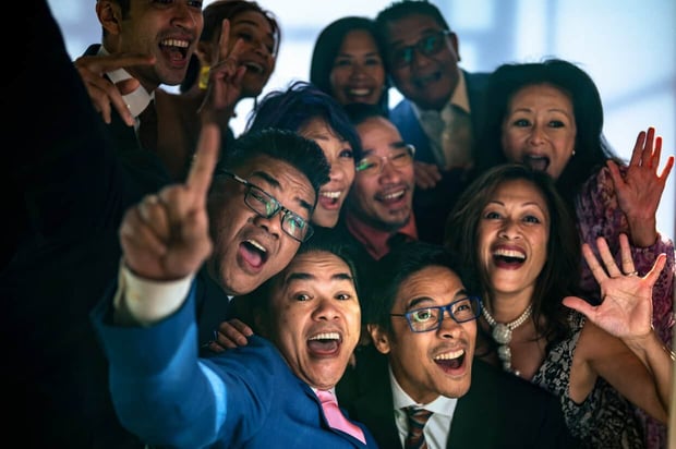 Michael Freas Photography wedding guests smiling and laughing