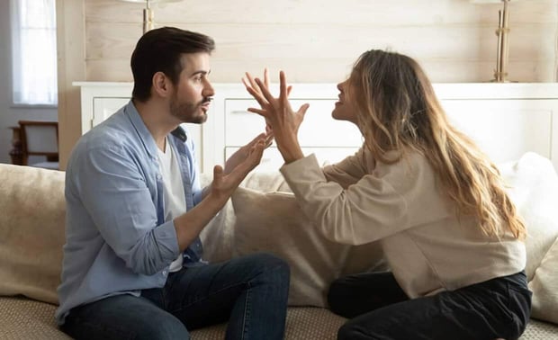 Photo of a male and female couple fighting