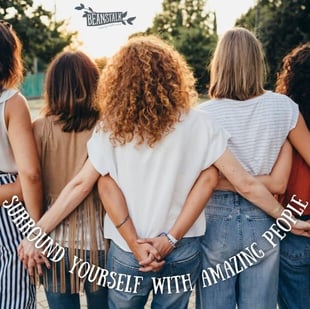 Photo of Beanstalk Mums Instagram page of five women holding hands and standing with their backs to the camera overlaid with the words surround yourself with amazing people