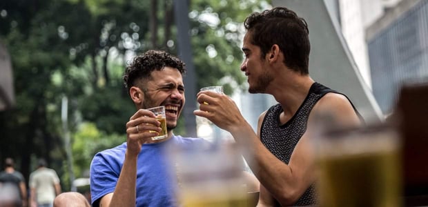 Photo of two gay men out drinking