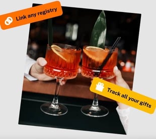 Screenshot from The Knot of a bride and groom clinking two cocktails together at their wedding