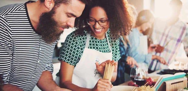 A couple in a cooking class