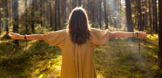 Photo of a woman in nature.
